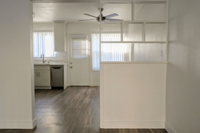 Sherman Oaks apartment for rent - A white kitchen with a fan on the ceiling.