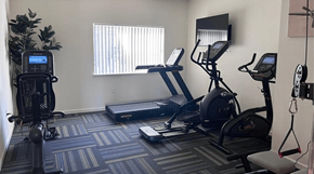 Folsom apartment for rent - A gym with treadmills, elliptical machines, and other exercise equipment.