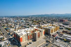 Richmond apartment for rent - A cityscape with buildings and roads under a clear sky.