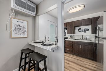 North Hollywood apartment for rent - A kitchen with a fridge, a sink and a counter.