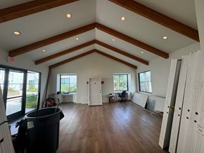 Arleta apartment for rent - a club room with a vaulted ceiling and wood floors
