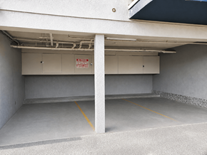 Van Nuys apartment for rent - A parking garage with a no parking sign on the wall.