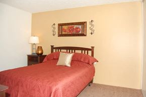 Modesto apartment for rent - a bedroom with a bed and bedside table