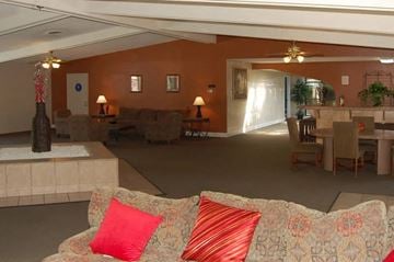 Modesto apartment for rent - a living room with a couch and a dining room