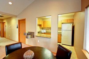 Lebanon apartment for rent - A modern kitchen with a dining table and chairs.