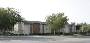Bakersfield apartment for rent - an apartment building with a street in front of it