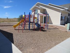 Taylor apartment for rent - a playground in front of a building