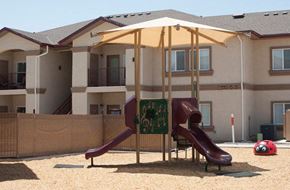Douglas apartment for rent - a playground with two slides and an umbrella