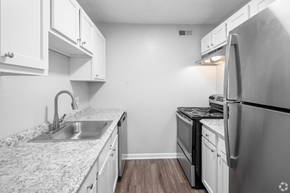 Nashville apartment for rent - A kitchen with a granite countertop and stainless steel appliances.