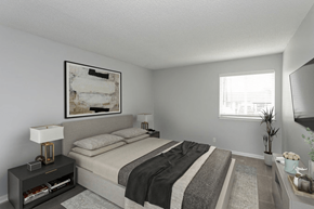 Nashville apartment for rent - A bedroom with a bed, nightstand, and a painting on the wall.