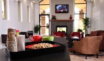 Wichita apartment for rent - a tray of food on a table in a living room