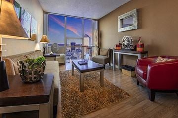 Wichita apartment for rent - a living room with a couch and a table and a window