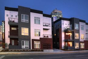 Wichita apartment for rent - a row of buildings with a street in front of them