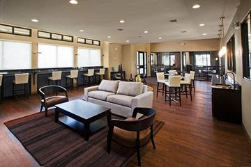 Wichita apartment for rent - a large living room with a couch and tables