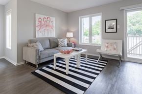 Ottawa townhouse for rent - a living room with a couch and a coffee table