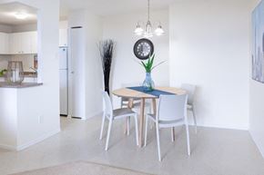 Gatineau apartment for rent - a dining room with a table and chairs