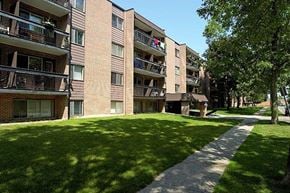 Kingston apartment for rent - a sidewalk in front of an apartment building