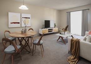 Kingston apartment for rent - A living room with a round wooden table and chairs, a television, and a coffee table.