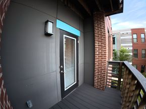Indianapolis apartment for rent - A balcony with a door and a window.