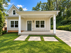 Greenville house for rent - A small house with a white porch and a green door.