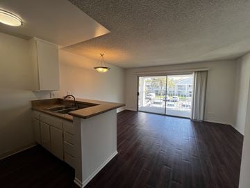 Santa Ana apartment for rent - A kitchen with a sink and a window.
