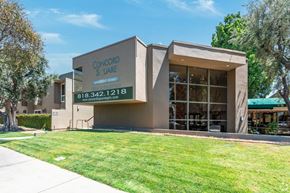 Reseda apartment for rent - a building with a lawn in front of it