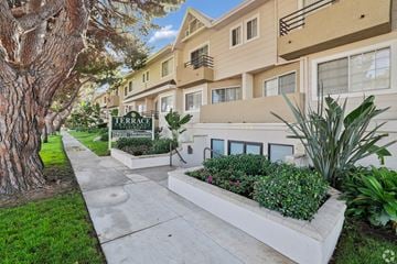Los Angeles townhouse for rent - A tree is on the left of a building with a sign that says Terrace.