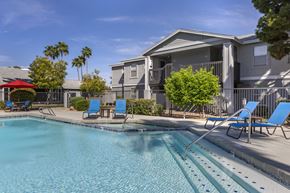 Phoenix apartment for rent - our apartments have a swimming pool with chairs and a house