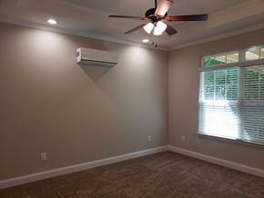 Gray townhouse for rent - Woodland Springs Townhomes | Spacious Bedrooms w/ Ceiling Fans