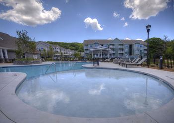 Resort-style pool with outdoor kitchen