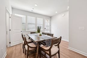 Decatur townhouse for rent - A dining room with a table and chairs.