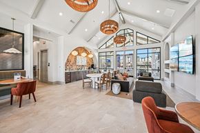 Canton townhouse for rent - A spacious room with a white ceiling and a large window.