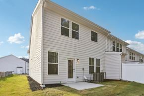 Hampton townhouse for rent - A house with a white exterior and a grey roof.