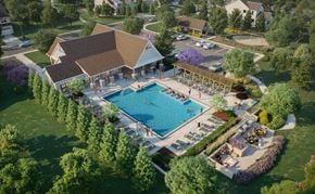 Winder apartment for rent - A large outdoor swimming pool surrounded by trees and a pavilion.