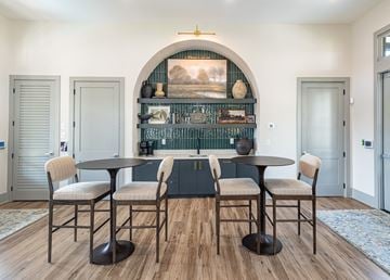 Gainesville townhouse for rent - A dining room with a table and chairs.