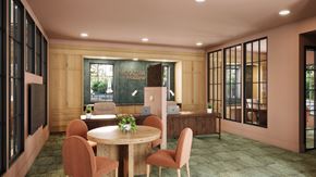 Parrish triplex for rent - A conference room with a table and chairs and a sign that says "MOGADISHU WALL".