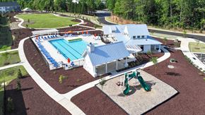 Holly Springs townhouse for rent - an aerial view of a building with a swimming pool