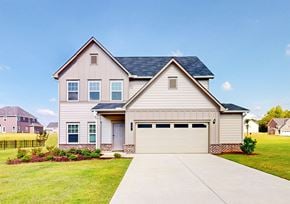 Winder apartment for rent - A house with a garage and a driveway in front.