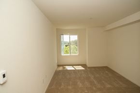 Oakland apartment for rent - the living room of an empty house with a window