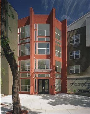 Walnut Creek apartment for rent - a red building with a tree in front of it
