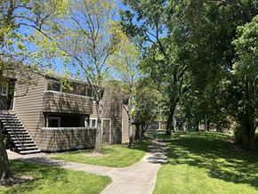 Santa Rosa apartment for rent - A building with a tree in front of it.