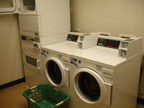 Pleasant Hill apartment for rent - a row of washing machines in a laundry room