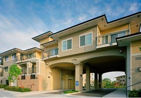 Pleasant Hill apartment for rent - a row of apartments with balconies and a driveway