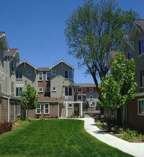 Santa Rosa apartment for rent - a view of a row of apartments with grass and trees