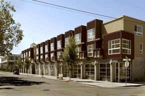 Oakland apartment for rent - a row of apartment buildings on the corner of a street