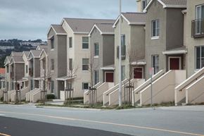 South San Francisco apartment for rent - a row of houses on a street with a road