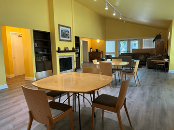 Santa Rosa apartment for rent - A living room with a fireplace and a dining table.