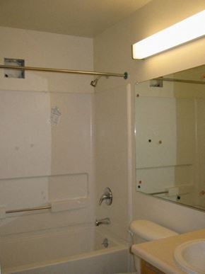 San Rafael apartment for rent - a white bathroom with a shower and a toilet
