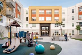 San Diego apartment for rent - children playing in a playground in a courtyard