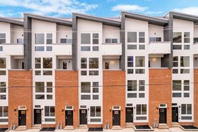Philadelphia apartment for rent - an apartment building with red brick and white windows